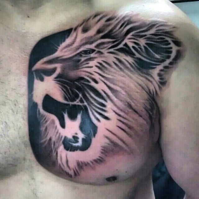 roaring lion tattoo with crown